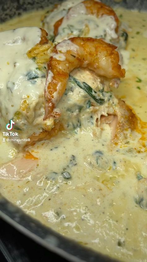 china.white__ on Instagram: Spinach and crab stuffed salmon topped with shrimp , smothered in a lemon garlic cream sauce. 🤤🤤🤤🤤 Recipe on my website under “recipes… Spinach And Crab Stuffed Salmon With Lemon Cream Sauce, Salmon With Lemon Cream Sauce, Lemon Garlic Cream Sauce, Garlic Cream Sauce Recipe, Crab Stuffed Salmon, Lemon Cream Sauce, Salmon With Lemon, Stuffed Salmon, Cream Sauce Recipe