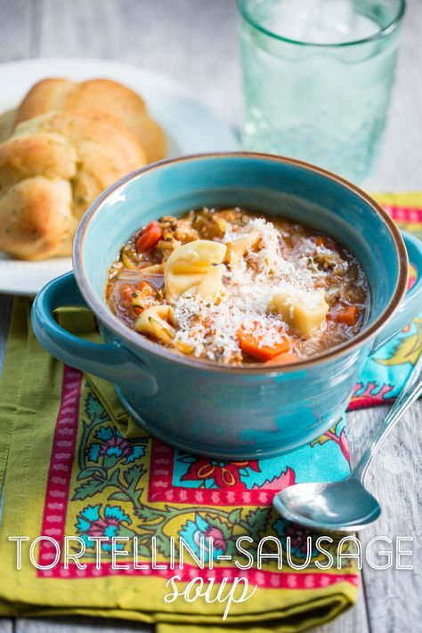 Hearty and satisfying, this tortellini sausage soup from Our Best Bites is one of our all-time favorite recipes! Sausage Tortellini Soup, Sausage Tortellini, Our Best Bites, Winter Meals, Sausage Soup, Tortellini Soup, Canned Tomato Sauce, Canned Chicken, Cheap Meals