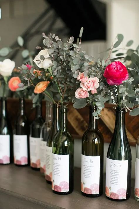 Wine Bottle Flower Arrangements, Wine Bottle Seating Chart, Wedding At Winery, Bottle Seating Chart, Wine Bottle Ideas, Wine Bottle Wedding Decor, Sitting Plan, Wine Bottle Flowers, Wine Bottle Centerpieces