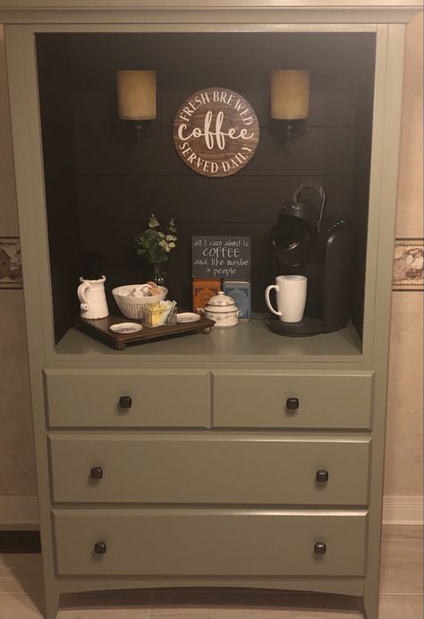 I redid an old armoire and converted into a coffee bar. Sanded it, painted it with GF milk paint in Basil and added laminate flooring for the back and sides and painted it in GF chocolate Brown and added lights. Line each drawer with fabric. Bar Armoire Ideas, Coffee Bar Armoire Ideas, Coffee Bar Armoire, Industrial Coffee Bar, Armoire Ideas, Industrial Coffee, Coffee Serving, Tall Dresser, Wine Bar