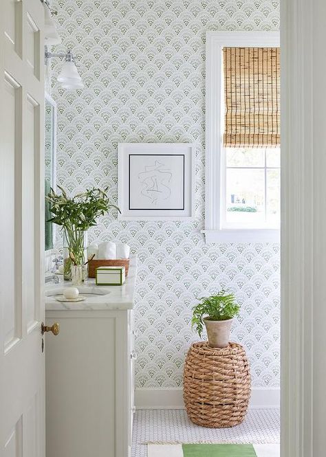 White and green transitional bathroom boasts walls covered in Sister Parish Chou Chou Wallpaper and a white dual washstand finished with glass knobs and a marble countertop holding round sinks with polished nickel cross handle faucets located beneath a white framed window lit by polished nickel sconces. Bathroom Wallpaper Green, Sister Parish, Transitional Bathroom, Subway Tiles, White Rooms, Green Bathroom, Bathroom Layout, Bathroom Wallpaper, Transitional Decor