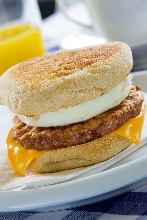 McDonald's has released their secret recipe for the Sausage and Egg McMuffin. Enjoy this classic breakfast sandwich at home. Here's the official recipe. Egg Mcmuffin Recipe, Sausage And Egg Mcmuffin, Resep Makanan Beku, High Protein Muffins, Hot Sandwich Recipes, Savory Muffins Recipes, Breakfast Muffin, Egg Mcmuffin, Freezer Breakfast Sandwiches