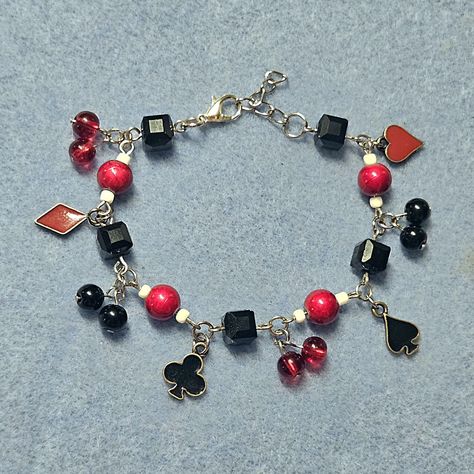 suits of cards bracelet!! SOLD -handmade by me -made using red and black glass beads, white seed beads, and metal charms #handmadegifts #handmadejewelry #handmade #jewelry #jewelrymaker #jewelrydesigner #goth #alt #shopsmall #smallbusiness Alternative Jewelry, Metal Charms, Metal Charm, Jewelry Maker, Sell Handmade, Black Glass, Charm Bracelets, Red And Black, Seed Beads