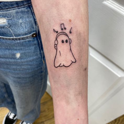 Ghost Music Tattoo, Ghost Listening To Music Tattoo, Ghost With Headphones Tattoo, 90s Tattoo Ideas, Movie Quote Tattoos, Phoebe Bridgers Ghost, Edm Tattoo, Matching Ghost Tattoos, Tattoo Kiss