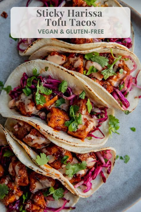 Sticky Harissa Tofu Tacos, spicy and sweet glazed tofu served with crunchy tangy slaw. An easy weeknight dinner that can be cooked in 30 minutes. Harissa Tofu, Tangy Slaw, Glazed Tofu, Cooking Therapy, Protein Vegetarian, Tofu Marinade, Tofu Tacos, Veggie Tacos, Healthy Mexican