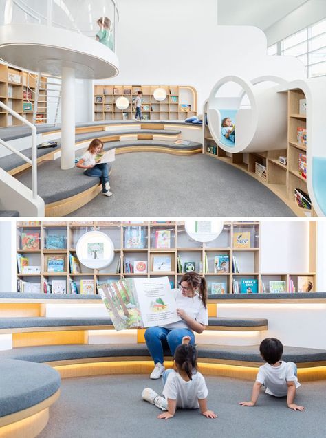 This quiet room at a children's play center has a with a library of books, where the children can sit and read by themselves, or with an adult. Tiered seating and various reading nooks create unique spaces for reading and storytelling. Children Library Design, Playground Inside, Library Seating Area, Moon Walking, Cafe Creative, Library Seating, School Library Design, Kindergarten Interior, Tiered Seating