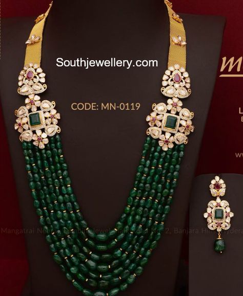 22 carat gold multistring emerald beads mala with side motifs studded with uncut diamonds, rubies and emeralds paired with matching earrings by Mangatrai Neeraj jewellers.  Emerald mala, pacchalu necklace, pusalu haram models 2018, pusalu necklace designs Emerald Mala, Emerald Beads Mala, Beads Mala, Pearl Necklace Designs, Beaded Necklace Designs, Antique Jewelry Indian, Snowflake Pendant, Gold Pendant Jewelry, 22 Carat Gold