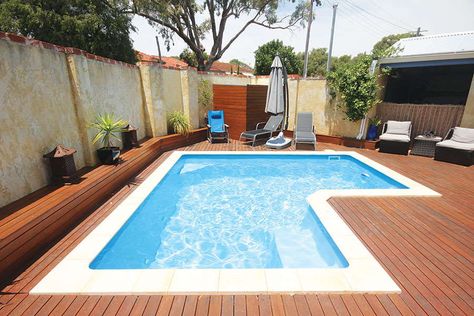 Main reasons for choosing an L-Shaped Pool #ingroundpools Backyard Ideas Pool, Pool Deck Lighting, Pool Decking Ideas, Alfresco Ideas Australia, L Shaped Pool, Pool Deck Furniture, Pool Deck Tile, Pool Deck Decorations, Swimming Pool Kits