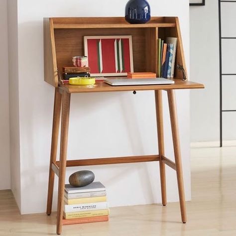 For a work area that knows how to multitask, there's no candidate better suited for the position than a secretary desk. Flip open the top when you're ready to get down to business, then fold it away in time for happy hour with something like this West Elm Mid-Century Mini Secretary Modern Secretary Desk, Organized Desk, Highly Organized, Rental Ideas, 60s Furniture, Apartment Deco, Desks For Small Spaces, Shared Office, Babe Cave