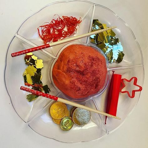 💕playtime with Immie 💕 on Instagram: "CHINESE NEW YEAR PLAY DOUGH I enjoy a theme... I made red play dough using @myteachermummyandme play dough recipe. I added glitter and then found a few red and gold bits to the play dough. Immie soon got stuck in and began by poking the play dough with the chop sticks! The play soon turned into a kitchen role-play so we added bowls and spoons and she wanted to cut it up and mix it. (See my stories for more) #playdough #playdoughfun #chinesenewyearactivit Play Dough Recipe, Chinese New Year Activities, Red Play, Chop Sticks, Playdough Recipe, Homemade Playdough, Play Dough, Fine Motor Activities, Indian Spices