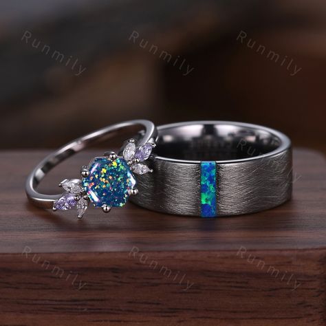 Here we have a Blue Fire Opal Ring Set for Couples, Matching Promise Ring Set, His and Hers Wedding Ring, Silver and Tungsten Ring, Hexagon cut Opal Engagement Ring Anniversary rings. ITEM DESCRIPTION ✦ Handmade, high-quality item! ✦ Material: Sterling Silver/Tungsten ►Sold as a two-piece set ►His ring is Silver Tungsten Carbide with Baguette Blue Opal ►His band width: 8mm ►His tungsten ring will not turn green itself and will not cause your skin to turn green.  ✦ Durable - Incredibly Scratch-Re Rings His And Hers, Cheap But Beautiful Engagement Rings, Silver And Blue Wedding Ring, Australian Black Opal Engagement Ring, Couple Promise Rings Matching Set, Blue Engagement Ring Silver, Silver Engagement Ring And Wedding Band, Galaxy Wedding Ring, Wedding Rings Ideas Couple