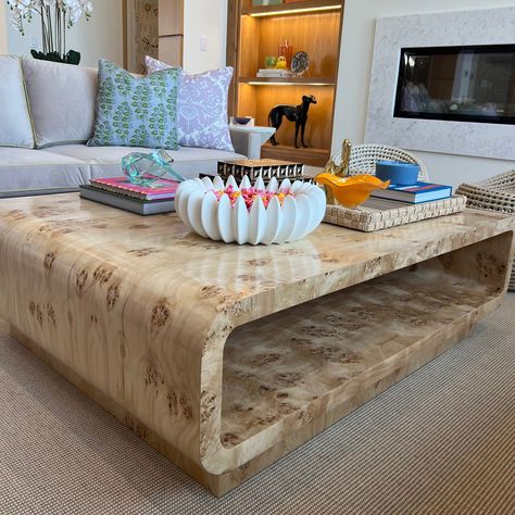 Finish shown: Burl Wood - Olive Ash Golden Oak, Mappa Natural The Elisabeth Coffee Table is named after Aryn’s favorite baking and foodie blogger Elisabeth from 'Elisabeth & Butter'. Have you tried her salted peanut butter and chocolate chip cookies? The Elisabeth Coffee Table is not only sleek and stylish, but it's also kid-friendly with its soft curved edges. We love this coffee table because it allows you to style coffee table books or a large tray on the bottom shelf. Burl Wood Coffee Table Living Rooms, Big Square Coffee Table Decor, Large Coffee Table Books, Eclectic Coffee Table Decor, Large Coffee Table Styling, Coffee Table Book Styling, Condo Aesthetic, Burlwood Coffee Table, Statement Coffee Table