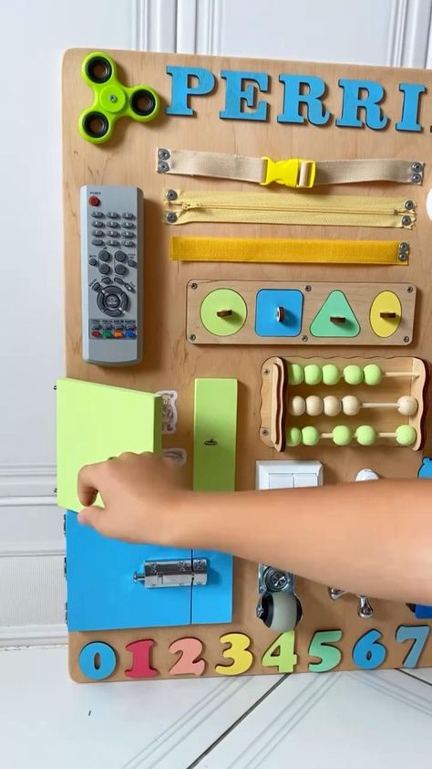 Busy board, Baby busy board, Busy board for toddlers, Montessori busy board, Educational toy | Busy boards for toddlers, Diy busy board, Diy montessori toys Senzorne Table, Busy Boards For Toddlers Diy, Baby Activity Board, Diy Toddler Toys, Diy Busy Board, Montessori Busy Board, Diy Montessori Toys, Toddler Busy Board, Toddler Activity Board