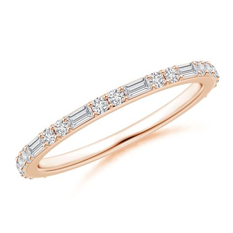 Exuding sophisticated allure, this stackable band in 14k rose gold looks distinctive and striking. It showcases glittering baguette and round diamonds that are alternately set in a half eternity style. Baguette Wedding Band, Stackable Bands, Stackable Ring, White Ring, Stackable Rings, 18k Rose Gold, White Diamond, Round Diamond, Diamond Rings