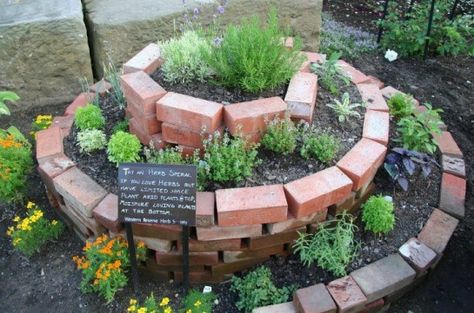 An Herb Spiral with directions on where to put what herbs! Raised Bed Flower Garden, Brick Raised Beds, Herb Spiral, Spiral Garden, Herb Garden Design, Permaculture Gardening, Indoor Herb Garden, School Garden, Herbs Indoors