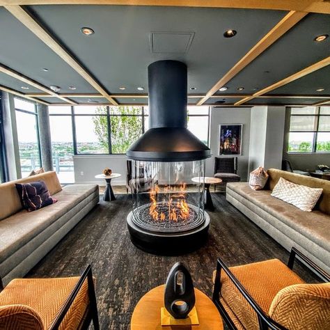 Experience BOLD living alongside this gorgeous custom circular fireplace! 🔥
We feel honored to have been chosen by John Moriarty & Associates of Virginia to partner on The Burton DC project.

#roundfireplace #customfireplacedesign #multifamily #luxuryfireplace #luxuryliving #luxuryapartment #theburton #noma #dcliving #unionmarket #luxuryproducts #customgasfireplace #circularfireplace #relaxingfire #unwind #livingroomfireplace #indoorfirepit #circulargasfireplace #luxury #interiordesign #design Restaurant With Fireplace, Circular Fireplace, Restaurant Fireplace, Round Fireplace, Fireplace Lounge, Fireplaces Modern, Focus Fireplaces, Indoor Gas Fireplace, Dream Fireplace