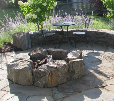 Boulder Fire Pit Boulder Fire Pit Ideas, Flagstone Patio With Fire Pit, Boulder Fire Pit, Pit House, Natural Fire Pit, Patio With Fire Pit, Fire Pit With Rocks, Fire Pit Materials, Fire Pit Ring