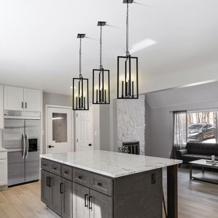 Pendant Lights Over Kitchen Island Cathedral Ceiling, Kitchen Island Lamps, Gray Black And White Kitchen, White Kitchen With Colored Island, Light Cabinets Kitchen, Gray Wall Kitchen, 2024 Home Decor Trends Interiors, Black Kitchen Light Fixtures, Black Island White Cabinets