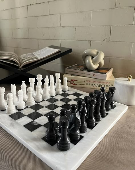 Introducing The Marble Chessboard. Crafted in solid marble, the set works as a great gift for chess lovers and can be used as a bold decor piece when not in use. DM to Order #justserene Chess Interior Design, Chess Board Aesthetic, Chess Decor, Amsterdam Apartment, Marble Chess Set, Chess Boards, Bold Decor, Chess Sets, Coach House