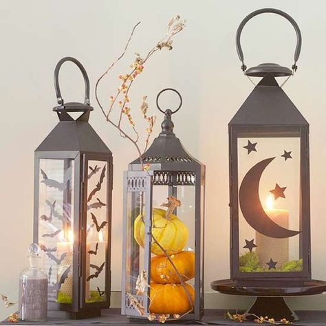 DIY Halloween project.  Attach moon, stars, and bats to lanterns.  Add candle and moss to finish.  In another lantern, add small pumpkins. Halloween & Fall decor. Unique Halloween Crafts, Halloween Lanterns Diy, Fall Lanterns, Halloween Heart, Halloween Decorations To Make, Halloween Printables Free, Easy Halloween Decorations, Diy Halloween Decor, Halloween Lanterns