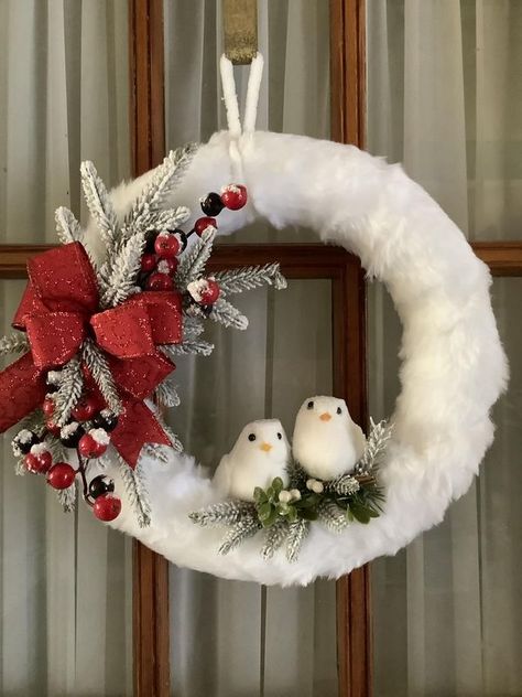 Handmade Craft Ideas | Hi my name is Gisele, I’ve been crafting for about 25 years, I make wreaths mostly but I’ve branched out to making many different things | Facebook Fur Christmas Wreath, White Christmas Wreaths, Christmas Wreath White, Handmade Craft Ideas, White Christmas Wreath, White Birds, Winter Wreaths, White Bird, Red Birds