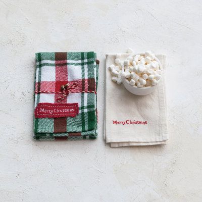 Add some cozy and festive flair to the home with these brushed cotton flannel and linen tea towels. This set of two tea towels comes in a red and white colour scheme that complements any decor. Each tea towel features a beautiful embroidery of "Merry Christmas" in a beautiful font and a decorative border that adds some elegance and charm. The tea towels are made of a cotton and linen blend, which makes them soft, absorbent, and durable. They are also tied with twine and jingle bells, which makes them a lovely gift for friends and family. Elevate every kitchen routine and dry dishes in style with this absorbent and beautifully designed tea towel. Prep & Savour | Prep & Savour Brushed Cotton Flannel And Linen Tea Towels w/ Merry Christmas Embroidery | C112085964 | Wayfair Canada Embroidery Kitchen Towels, Merry Christmas Embroidery, Embroidery Kitchen, Tea Towel Gift, Christmas Towels, Creative Co Op, Tea Towel Set, Linen Tea Towel, Christmas Tea