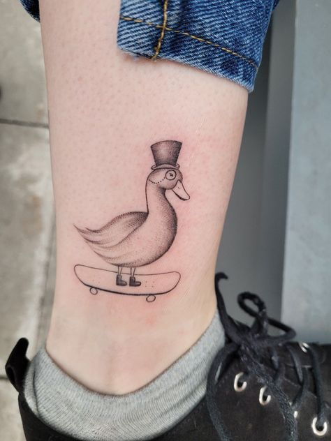 Tattoo duck skateboard monocle ankle fine line top hat Duck Skateboarding Tattoo, Duck With Hat Tattoo, Duck On Skateboard Tattoo, Duck On A Skateboard, Goose Drawing, Goose Tattoo, Skateboard Tattoo, Swan Tattoo, Fun Tattoo