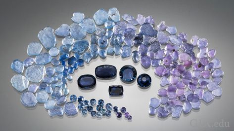 This suite of rough and cut Yogo sapphires shows the wide range of blue to violet or purple hues and light to dark saturation combinations that can be found in Yogo sapphires. The largest faceted stone is a 1.44 ct cushion cut. Courtesy of Bill Vance. Photo by Kevin Schumacher Yogo Sapphire, Contemporary Jewelry Design, Missouri River, Cut Photo, Rock Creek, Jewelry Design Inspiration, Diamond Engagement Rings Vintage, Rough Crystal, Montana Sapphire