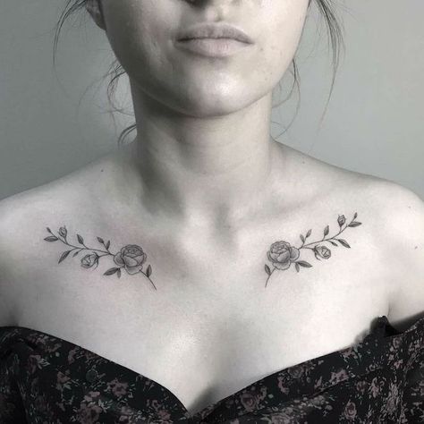 white-background-small-roses-under-colarbones-chest-tattoos-for-women-black-top Lock Tattoo, Tattoo Sonne, Clavicle Tattoo, Symmetrical Tattoo, Tattoo Trend, Bone Tattoos, Tattoo Zeichnungen, Cool Chest Tattoos, Cat Tattoos