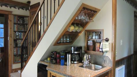 kitchen under stairs - wonderful use of small space. (Sundre,AB - photo by Joan Cody) Bungalow Staircase, Stair Styles, Hidden Stairs, Kitchen Under Stairs, Small Kitchen Set, Vintage Eclectic Home, Under Stair, Stairs In Kitchen, Home Bar Cabinet