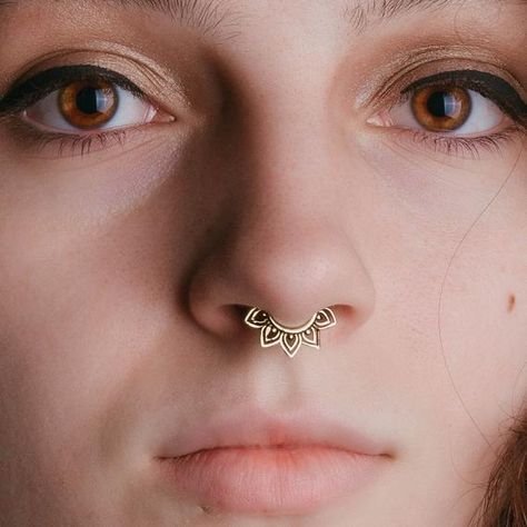 Tribal Flower Septum Ring, 16 Gauge Septum Piercing #flowerseptumring #16gseptumring #piercingnez #septumjewelry #septumnosepiercing #septumpiercingring #septumnoserings #goldseptumring #septumandnosering #septumjewelry16g #16gaugeseptumring #uniqueseptumrings #tribalseptumring Nose Piercing Gold, Septum Nose Piercing, Gauge Septum, Gold Septum Ring, Gold Septum, Pierced Nose, Sterling Silver Nose Rings, Faux Septum, Nose Piercing Hoop