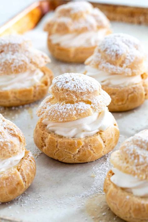 Cream puffs are a classic French dessert made to impress! Crispy hollow shells of choux pastry baked until golden brown then filled with whipped cream. #creampuff #frenchdessert #dessert Desserts Superbowl, Bowl Desserts, Homemade Cream Puffs, Superbowl Desserts, Classic French Desserts, Cream Puff Recipe, Pastry Cook, Cream Puff, Choux Pastry