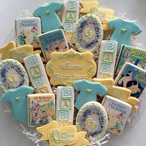 A new chapter begins...storybook baby shower. #decoratedcookies #decoratedsugarcookies #cookies #cookiesofinstagram #customsweets #customcookies #desserts #babyboy #baby #babyshower #babyshowercookies #storybook #storybookbabyshower #readmeastory #anewchapterbegins #read #onceuponatime Baby Book Shower, Storybook Baby Shower Theme, Golden Book Baby Shower, High Tea Baby Shower, A New Chapter Begins, Book Shower, Birthday Sweets, Storybook Baby Shower, Book Theme