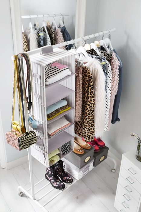 Folded shirts and sweaters take up space and can be hard to access in dresser drawers. For extra, easy-access storage for folded clothes, hang storage pockets, like SVIRA, from a clothing rack or closet pole. Diy Clothes Storage, Diy Clothes Rack, Tiny Closet, Hanging Clothes Racks, Smart Tiles, Open Closet, Clothes Closet Organization, Ikea Storage, Closet Shelves