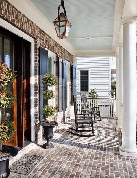 porch flooring ideas front porch decorating ideas brick flooring pros and cons Terasse Ideas, Estilo Charleston, Haint Blue Porch Ceiling, Blue Porch Ceiling, Veranda Design, Brick Porch, Porch Design Ideas, Traditional Porch, Haint Blue