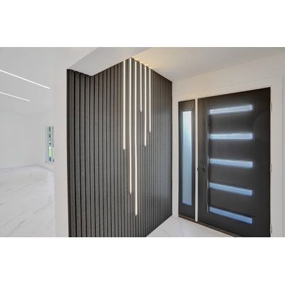 Durable PVC and wood fiber panels for interior and exterior decoration. They are designed to withstand the elements and can be used on decks, patios, and other outdoor spaces. Color: Black | Unique 8.62" x 114.17" Reclaime Wood Wall Paneling | 114.17 H x 8.62 W x 1 D in | Wayfair Modern Mudroom, Wood Wall Paneling, Wood Slat Wall, Barnwood Wall, Exterior Decoration, Pvc Wall Panels, Wall Exterior, Wood Fiber, Pvc Wall