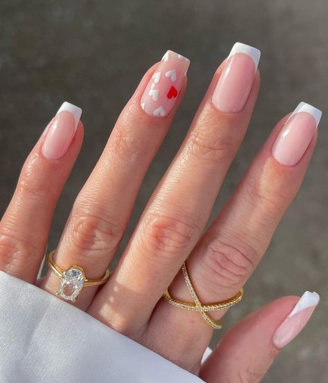 25 really cute Valentine's day nails to celebrate self love! We have minimalist heart nails, simple French tip nails with bows, February nails, red nails & pink nails for every type of nail shape: acrylic nails and short nails included! French Tip Nails For Summer, Nails Trends 2023, Nails February, Short French Tip, French Tip Gel Nails, Short French Tip Nails, Nails For Summer, Nails Heart, Short French