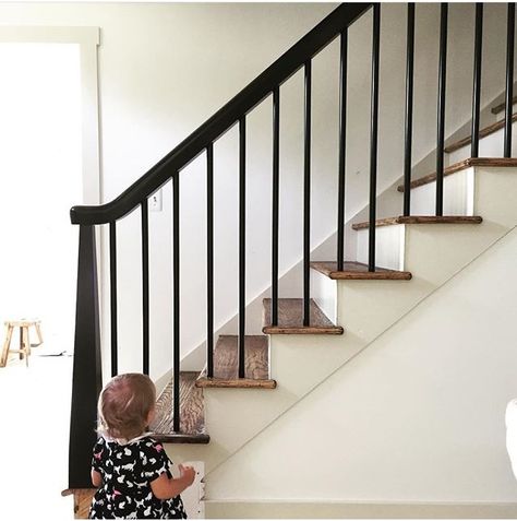 Our Finished-ish House--off white and white, black, simple railing                                                                                                                                                                                 More Black Banister, Wood Railings For Stairs, Redo Stairs, Stair Railing Makeover, Indoor Railing, Stairs Railing, Black Stairs, Iron Stair Railing, Stair Railing Design