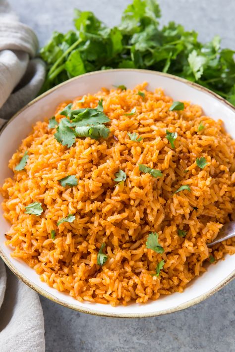 This easy Mexican Rice Recipe is a family favorite, toasted extra long grain white rice simmered in a blend of chicken broth, tomato sauce, and spices. Rice With Tomato Sauce, Homemade Mexican Rice, Authentic Mexican Rice, Mexican Rice Recipe, Little Sunny Kitchen, Mexican Rice Easy, Spanish Rice Recipe, Mexican Rice Recipes, Sunny Kitchen