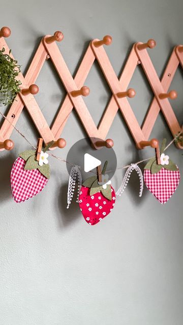 Katie | Crafter and Felt Enthusiast on Instagram: "It’s finally spring, which means summer is just around the corner! This sweet little strawberry garland is awesome because you can put it up in the spring and leave it up all the way through the summer while you are out enjoying the sunshine!   Also I’ve been thinking about how we decorate with faux food items around seasons. Carrots around Easter, pumpkins in the fall, candy canes around Christmas. I actually love doing it, but when I think about it… it is a little weird😆 Do you decorate with fruit decor or do you stay away from any type of food decoration?" Strawberry Garland, Spring Garland, Fall Candy, Fruit Decor, Faux Food, Banners Buntings, Enjoy The Sunshine, Think About It, Food Decoration