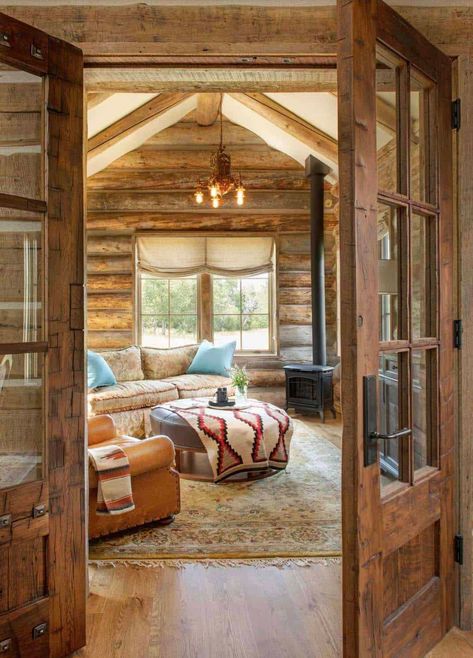 See a phenomenal mountain rustic dream home in Paradise Valley, Montana Mountain Cabin Living Room, Cabin Sunroom, Rustic Staircase, Rustic Family Room, Creek House, Cabin Living Room, Stone Chimney, Living Room Warm, Cabin Living