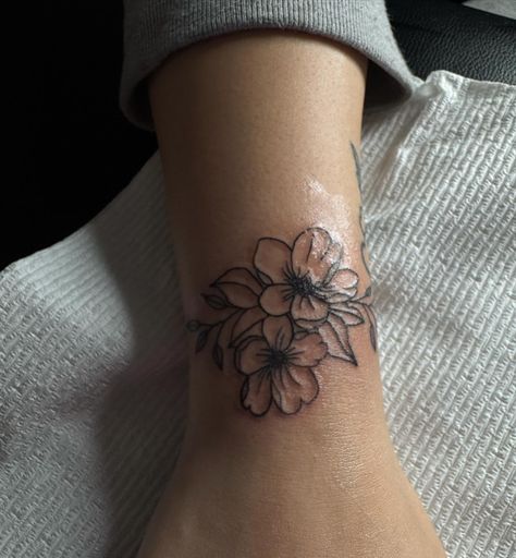 wrist tattoo ✨ Tattoos For Small Hands, Date On Wrist Tattoo, Floral Wrist Band Tattoo, Cover Up Tattoos On Wrist, Flowers And Cross Tattoo, Front Wrist Tattoos For Women, Side Of Wrist Tattoos For Women, Pretty Wrist Tattoos For Women, Hand Tattoo Women