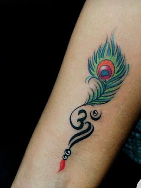 Peacock Feather Tattoo For Men, Om Peacock Feather Tattoo, Om With Peacock Feather Tattoo, Small Feather Tattoo Design, Krishna Peacock Feather Tattoo, Tetu Photo Hand, Peacock Tattoo Designs For Women, Peacock Feather Tattoo Design For Women, Flute And Peacock Feather Tattoo