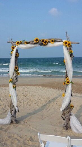 Sunflower Beach Wedding Ideas, Sunflower Beach Wedding, Sunflowers Decorations, Driftwood Arbor, Sunflower Wedding Arch, Sunflower Arch, Driftwood Arch, Garage Wedding, Sunflower Wedding Decorations