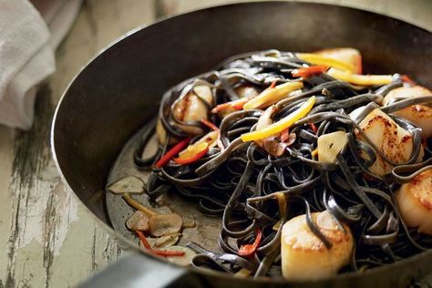 Simple scallops pair beautifully with dark squid ink linguine and preserved lemon. If you can't find an ink-stained pasta, regular linguine will work just as well. Winter Pasta Dishes, Seafood Scallops, Winter Pasta, Squid Ink Pasta, Linguine Recipes, Preserved Lemon, Preserved Lemons, Comfort Food Recipes, Midweek Meals