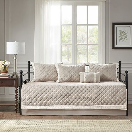 The Madison Park Levine 6 piece cotton daybed cover set offers an elegant farmhouse style update for your guest bedroom. This daybed cover features a diamond quilted khaki cotton face with an ivory trim border and hypoallergenic polyester filling, for a chic country look. The 3 matching shams pair perfectly with the daybed cover, while an oblong decorative pillow adds a complementary touch. A solid khaki bed skirt with a 15-inch drop is also included to complete this 6 piece daybed set. Machine Daybed Bedding Sets, Daybed Cover Sets, Sofa Daybed, Daybed Sets, Elegant Farmhouse, Home Essence, Daybed Bedding, Bed Cover Sets, How To Clean Pillows