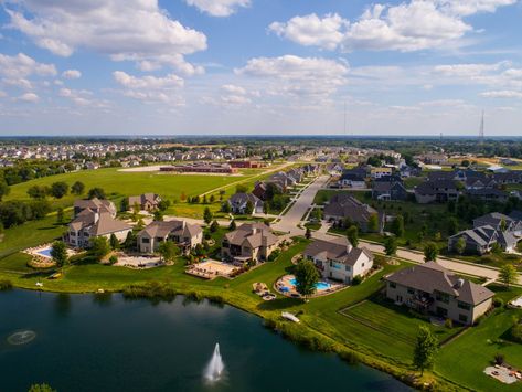 We did the math to calculate how much money you need to save monthly to buy a home by 35 Rural Neighborhood, Bettendorf Iowa, Buy A House, Aerial Images, Weekend Escape, Bachelors Degree, Pier Fishing, Best Places To Live, Lake Michigan