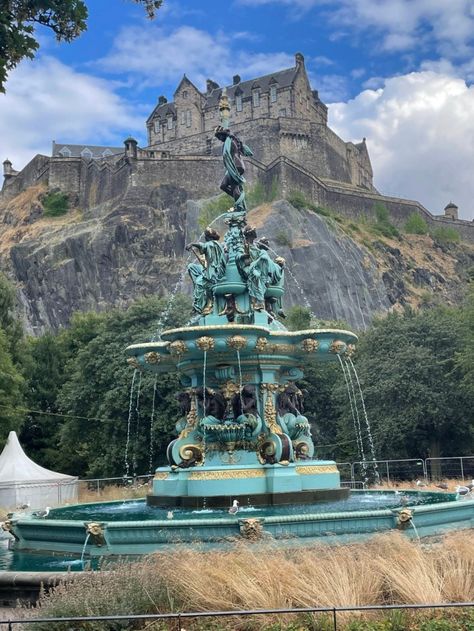 the ross fountain with the edinburgh castle in the background Edinburgh Castle, Edinburgh, Statue Of Liberty, Mount Rushmore, Scotland, Castle, Statue, Natural Landmarks, Travel