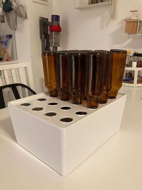 Bottle Drying Station, Beer Storage Ideas, Diy Bottle Drying Rack, French Bottle Drying Rack, Ikea Grundtal Drying Rack Hack, Diy Liquor Dispenser Instructions, Beer Bottle Diy, Bottle Dryer, Beer Bottle Crafts