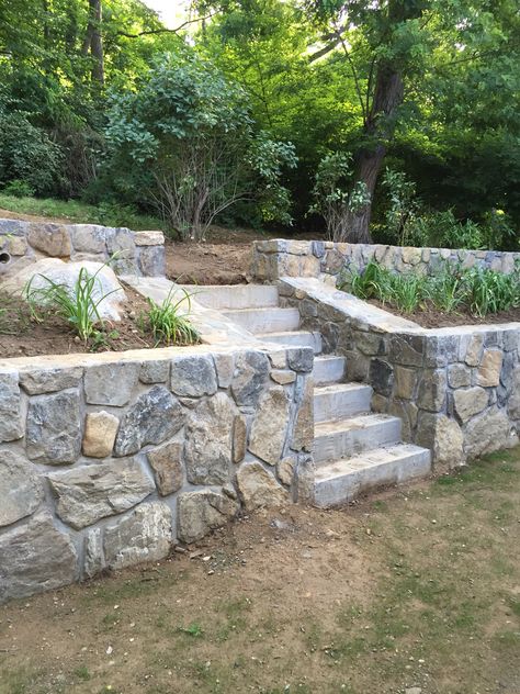 Retaining Wall With Stairs Ideas, Retaining Wall With Fireplace, Tri Level Backyard Ideas, Terraced Retaining Wall Ideas, Fieldstone Retaining Wall, Tall Retaining Wall Ideas, Retaining Wall Front Of House, Mountain Garden Ideas, Retaining Wall Garden Bed